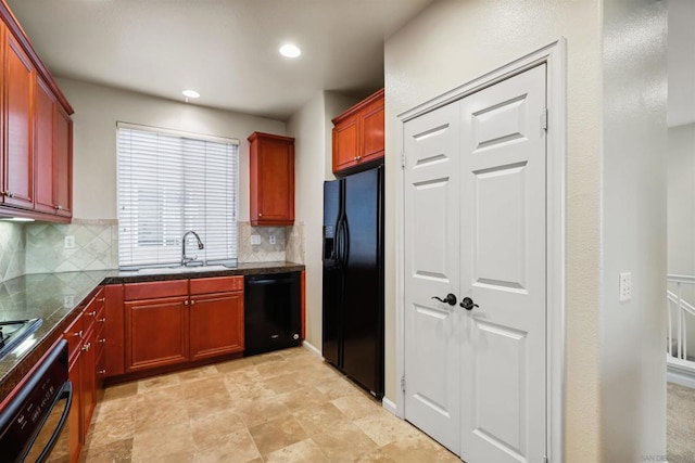 kitchen with tasteful backsplash, sink, and black appliances