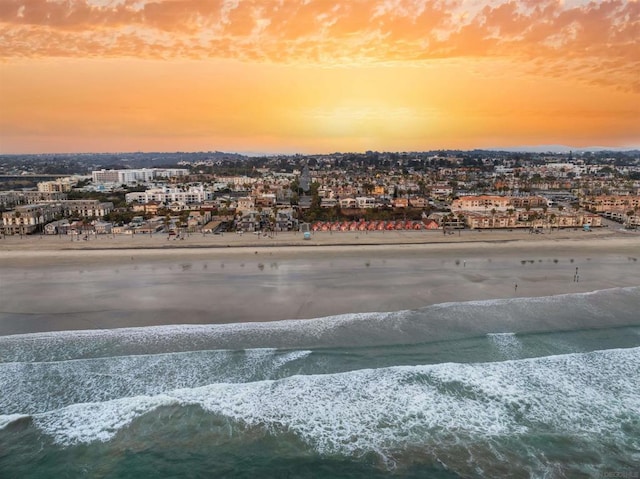 property view of water featuring a beach view