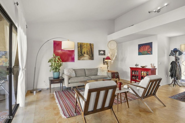 living room with lofted ceiling