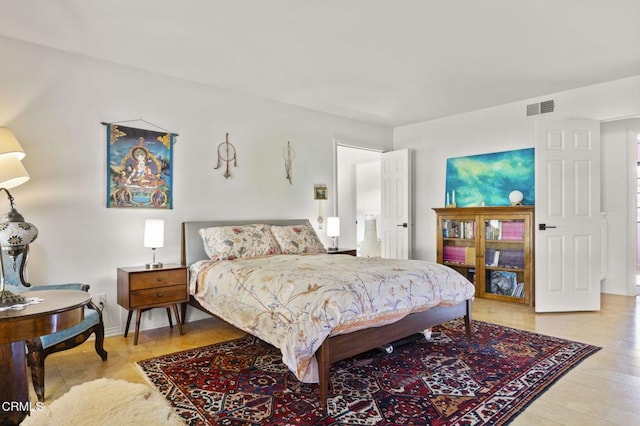 bedroom featuring hardwood / wood-style flooring