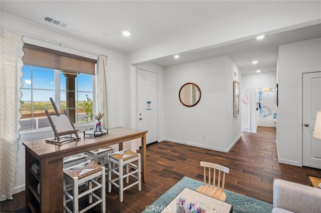 dining area featuring dark hardwood / wood-style floors