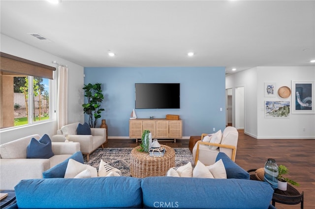 living room with dark wood-type flooring