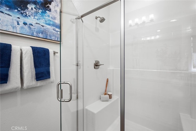 bathroom featuring an enclosed shower