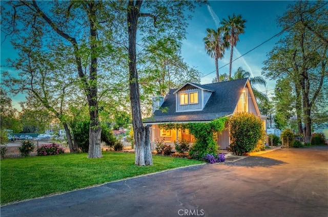 view of front of home with a front lawn