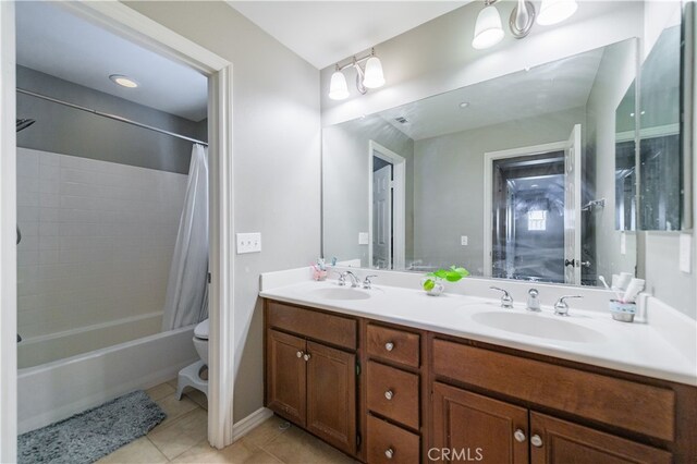 5185 Highview St, Chino Hills, CA 91709 - full bath with tile patterned floors, double vanity, and shower / bath combo with shower curtain