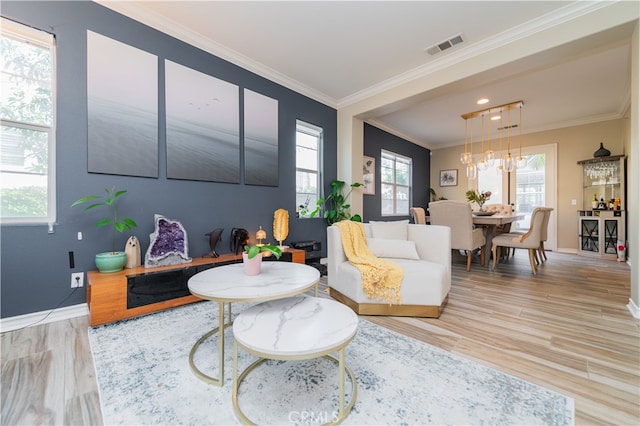 5185 Highview St, Chino Hills, CA 91709 - living room with crown molding, light wood-type flooring, and a chandelier