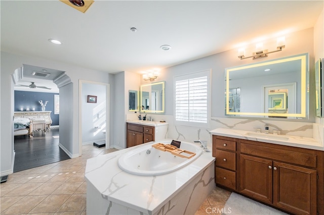 5185 Highview St, Chino Hills, CA 91709 - full bathroom featuring two vanities, a jetted tub, tile patterned flooring, ceiling fan, and ensuite bathroom