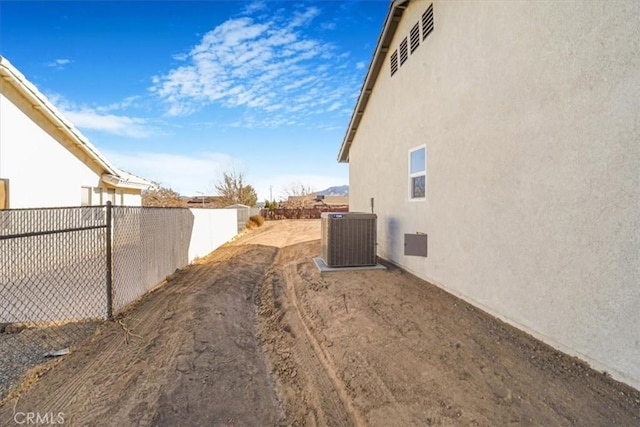 view of side of property featuring cooling unit