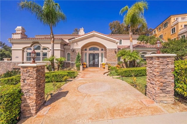 mediterranean / spanish house with french doors