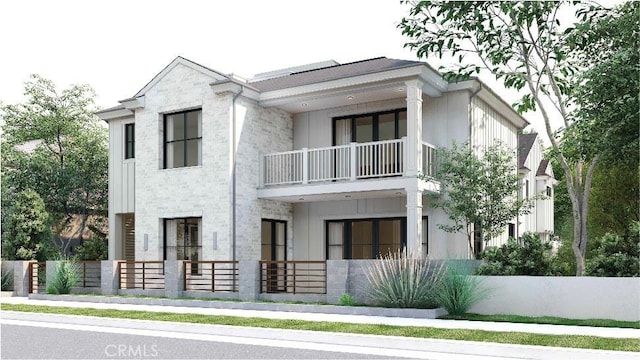 view of front of home with a balcony