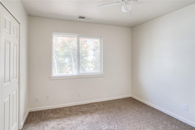 view of carpeted spare room