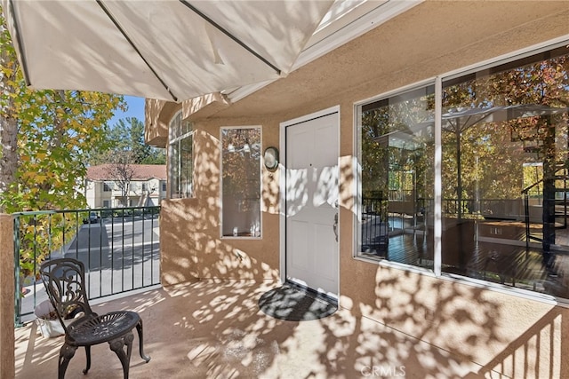 view of patio with a balcony