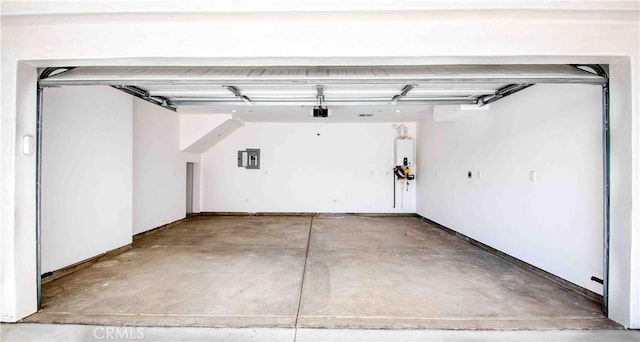 garage with electric panel and a garage door opener