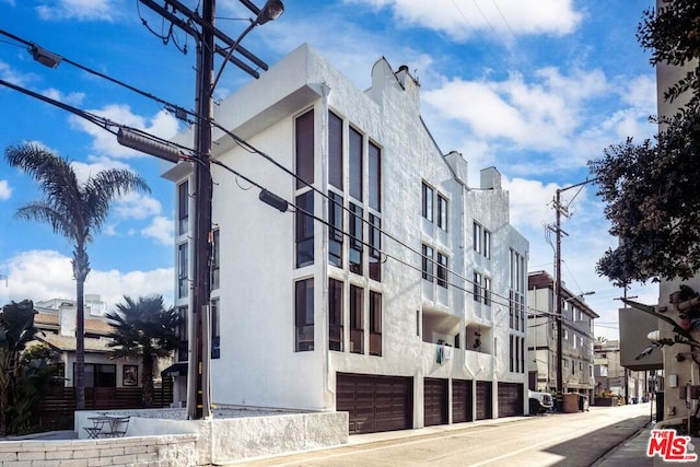 view of building exterior featuring a garage