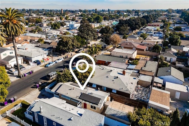 birds eye view of property with a residential view