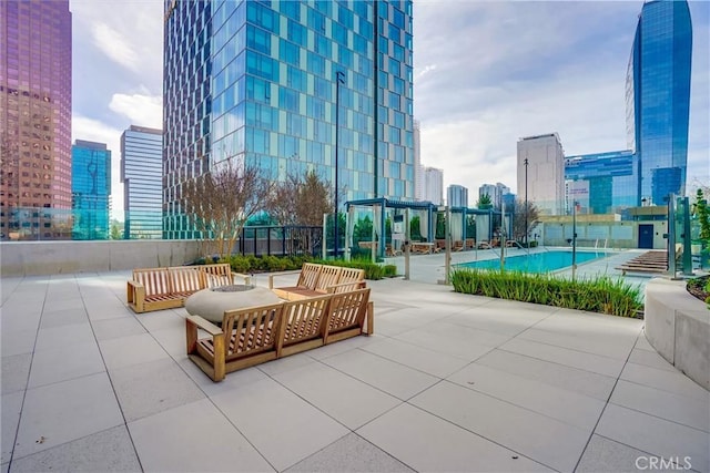 view of home's community with a patio area