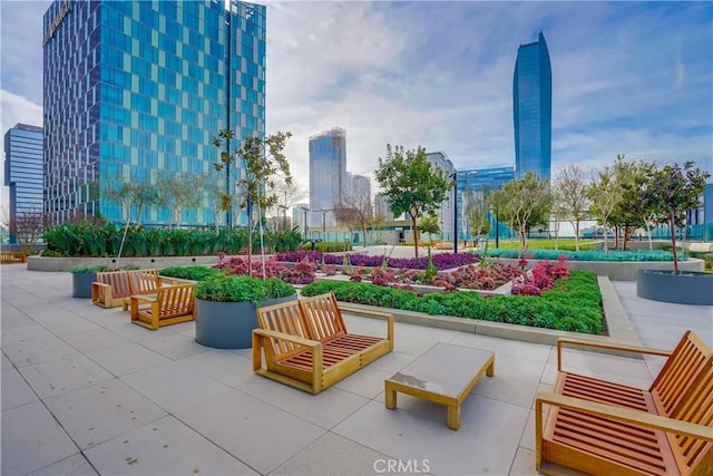 view of home's community featuring a patio area