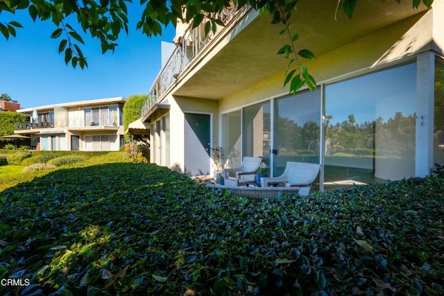 exterior space with a balcony