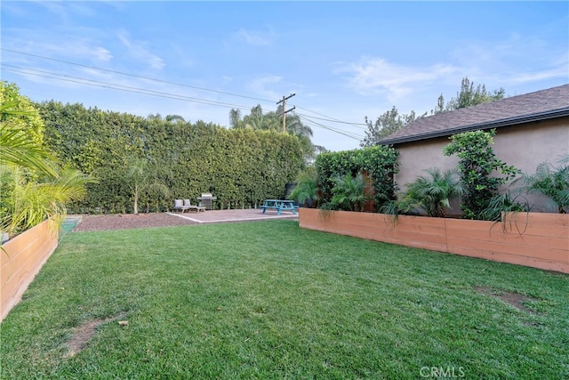 view of yard featuring a patio area and fence