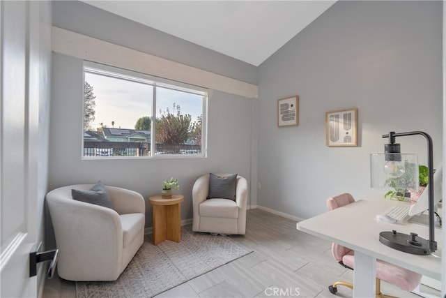 office area featuring vaulted ceiling