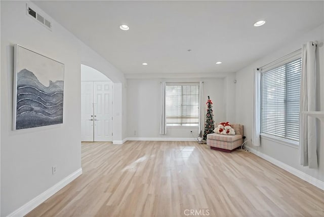 unfurnished room featuring light hardwood / wood-style flooring