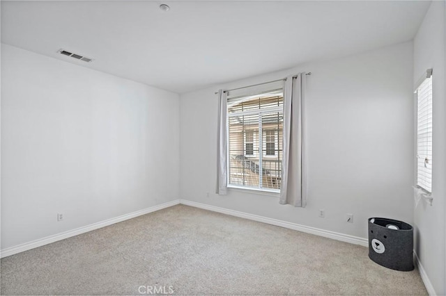 view of carpeted spare room