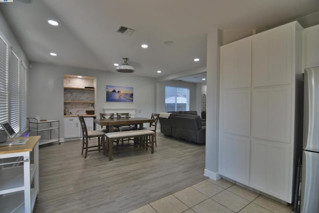 dining room featuring light wood-type flooring