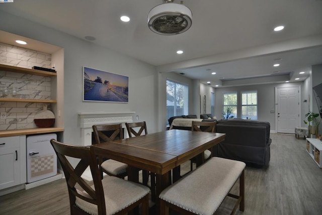 dining area with hardwood / wood-style floors