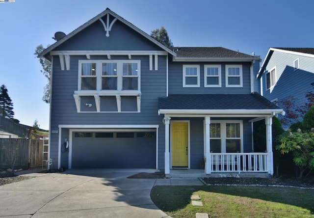 front facade with a porch and a garage