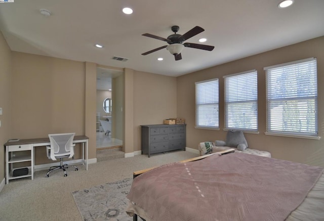 unfurnished bedroom featuring ceiling fan and light carpet