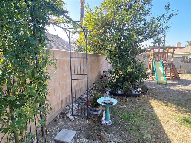 view of yard featuring a playground