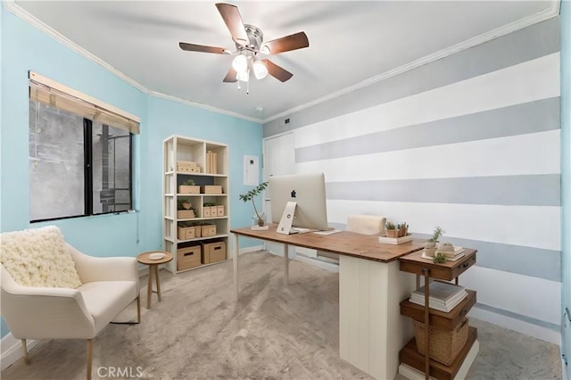 carpeted office with crown molding and ceiling fan