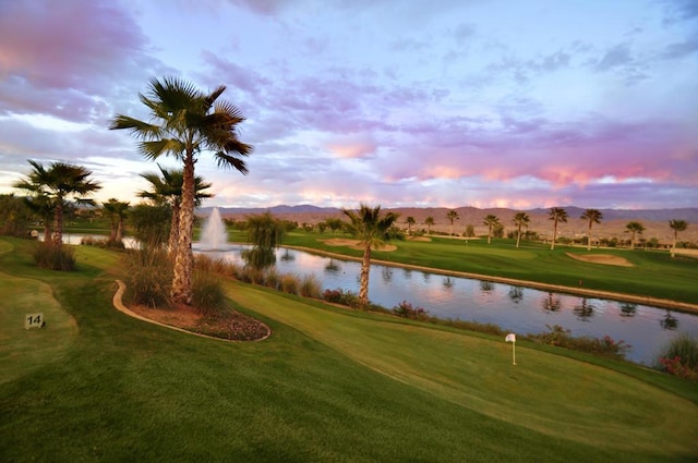 view of property's community featuring a water and mountain view