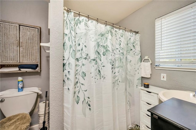 bathroom featuring vanity and walk in shower