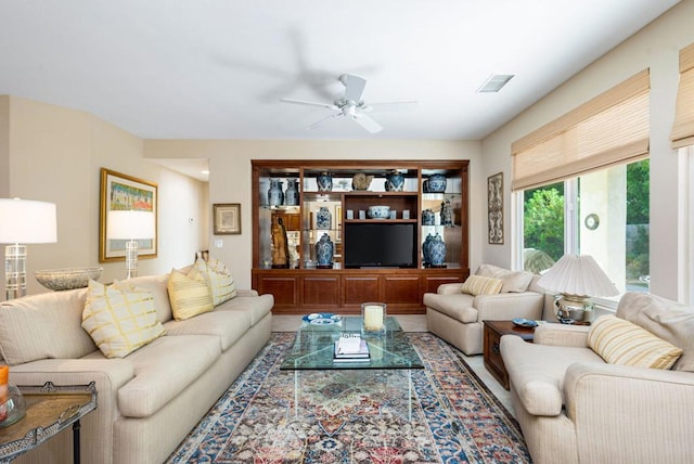 living room with ceiling fan