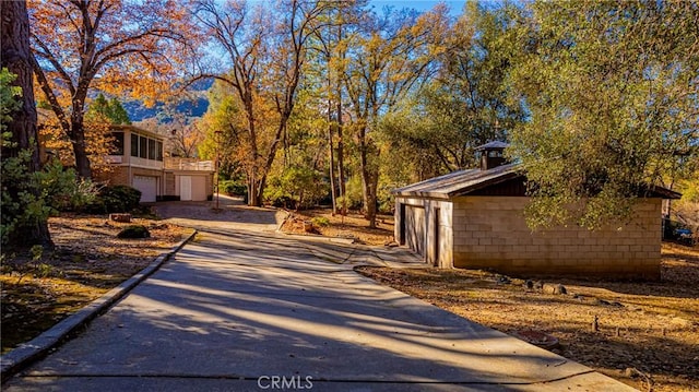 view of street with driveway