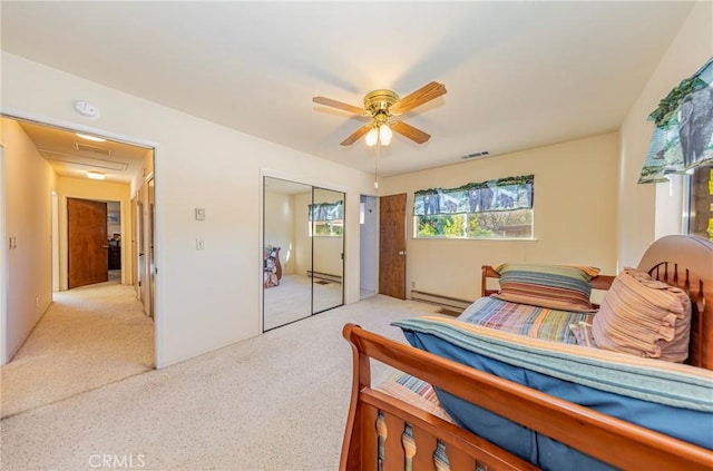 bedroom with light colored carpet, a baseboard radiator, visible vents, and ceiling fan