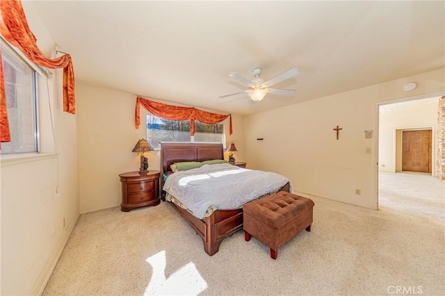 bedroom featuring carpet floors and a ceiling fan