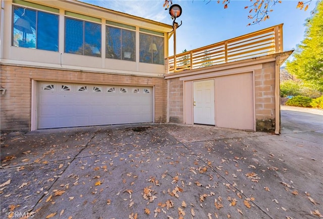 garage featuring driveway