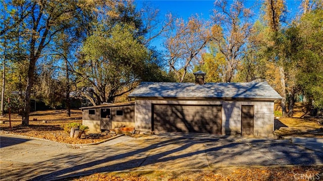 garage featuring driveway