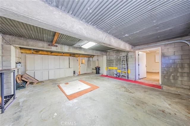 parking deck featuring concrete block wall