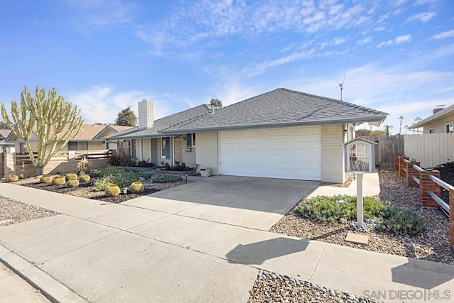 ranch-style home with a garage