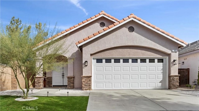 view of front of property with a garage