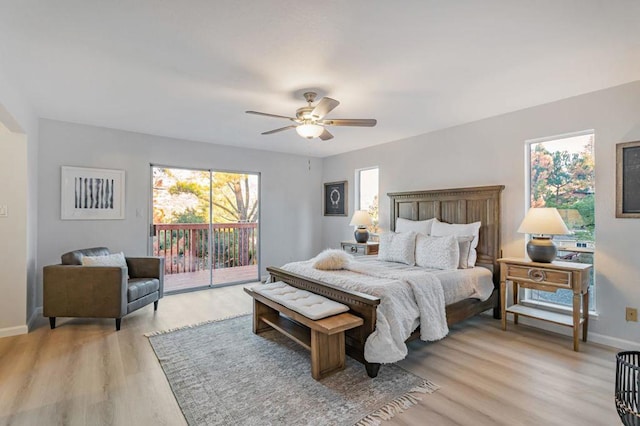 bedroom with access to exterior, ceiling fan, and light wood-type flooring