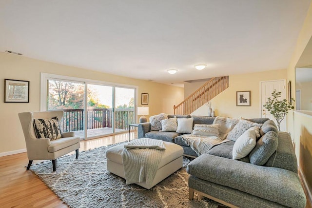 living room with light hardwood / wood-style floors