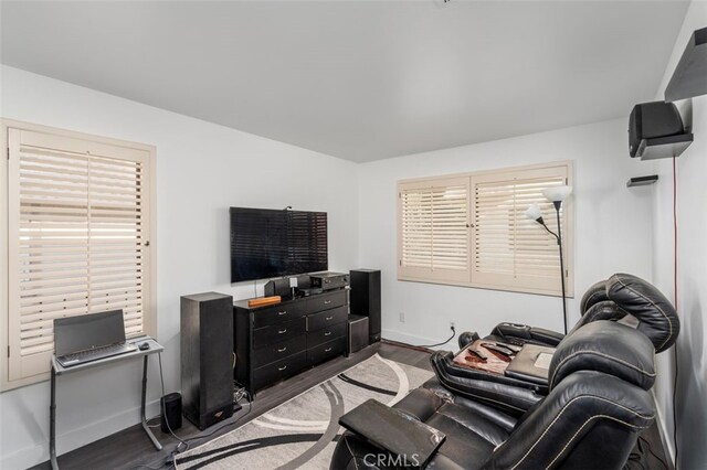 living room with dark hardwood / wood-style floors