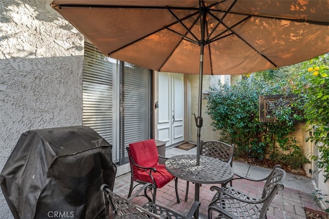 view of patio / terrace featuring french doors and area for grilling