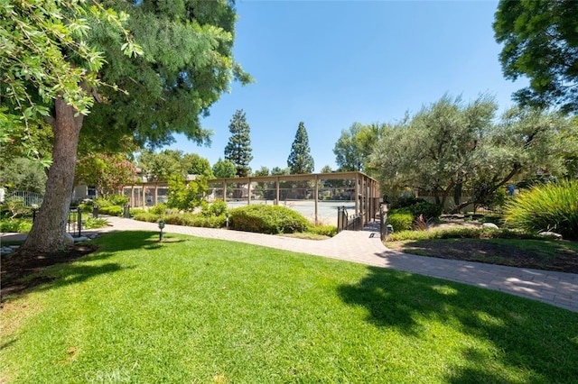 view of yard featuring tennis court