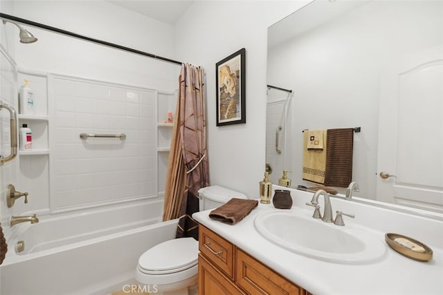 full bathroom with shower / tub combo, vanity, and toilet