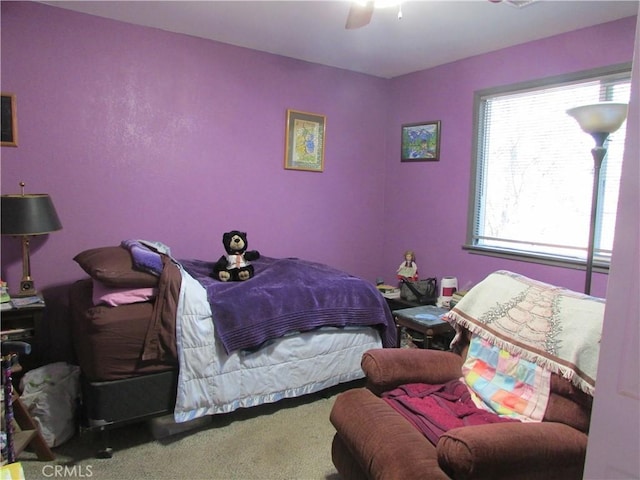 bedroom featuring carpet flooring and ceiling fan